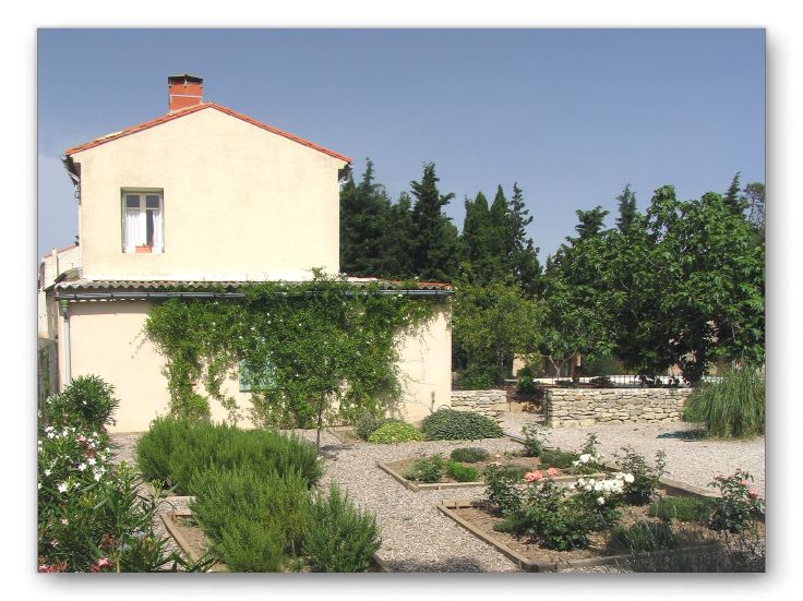 View of the house, looking East from the side garden.