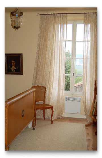 Large French windows make the bedrooms bright.